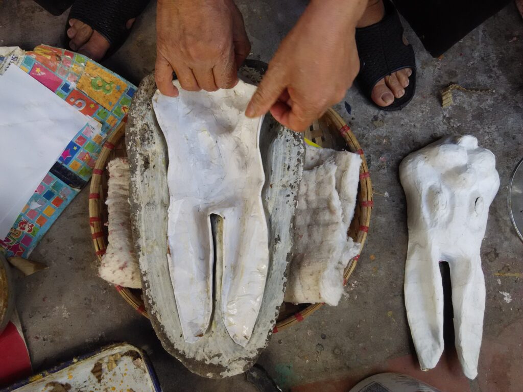 5. Carefully removing the mask from the mould